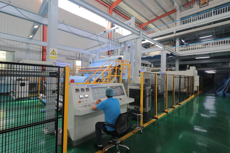 Xinyang Yihe Non-Woven Co., Ltd. lini produksi produsen